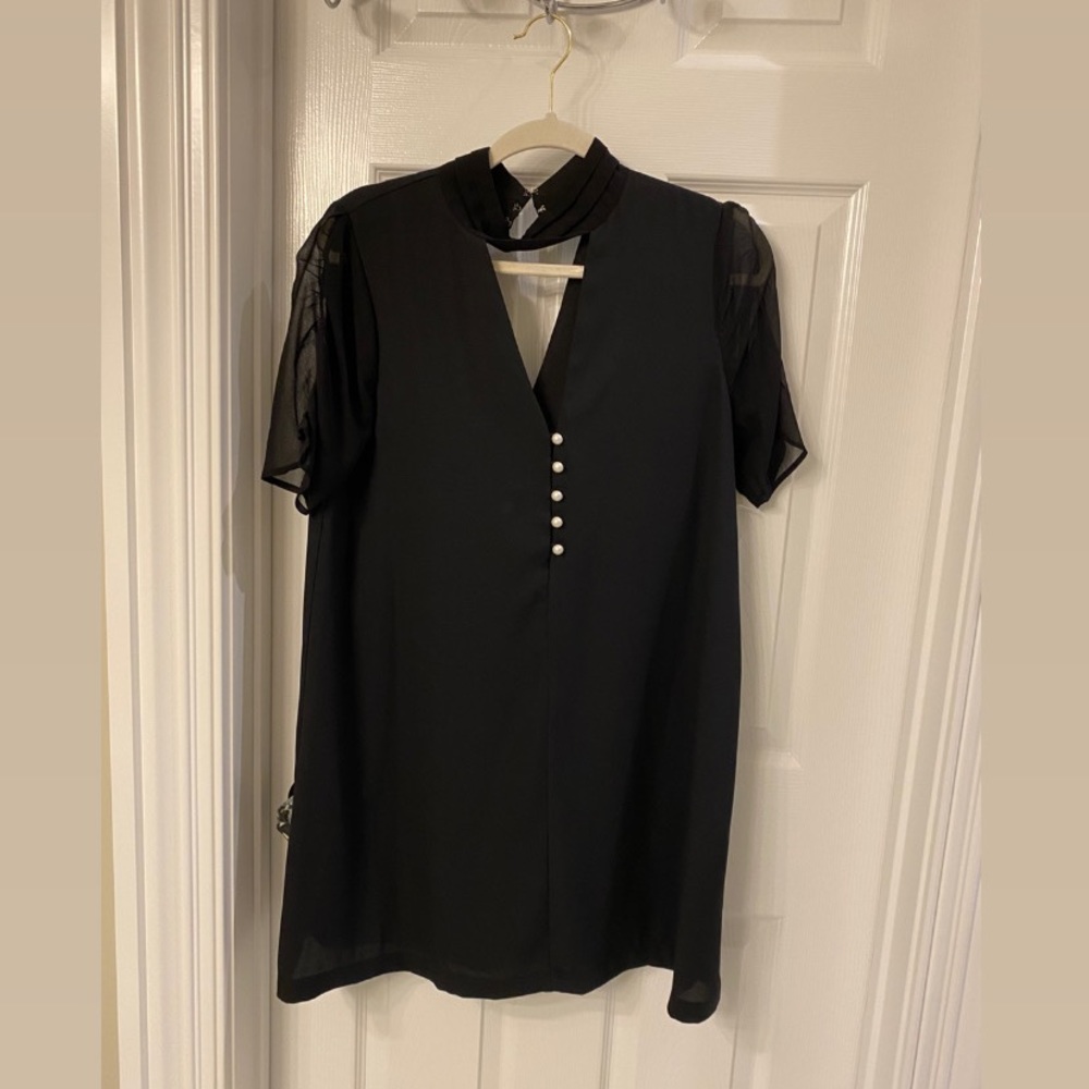 BCBG mini dress. Color: Black. Size: Small.